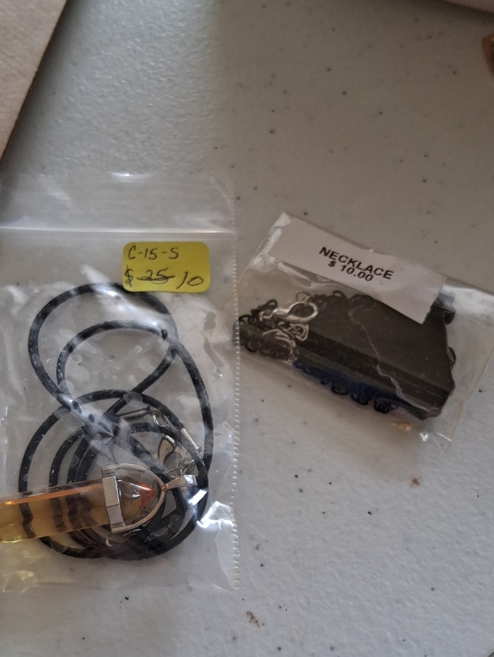 Source Unknown Black Leather Cord Necklace with Amber-Tone Pendant